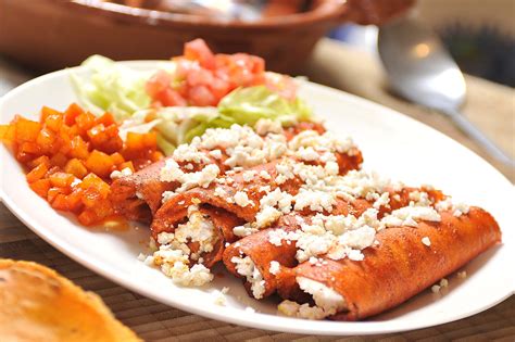 Tacos rojos - Tacos rojos are defined by their intensely flavorful, brick-red chile-tomato salsa. This speedy vegetarian recipe makes them doable any night of the week.